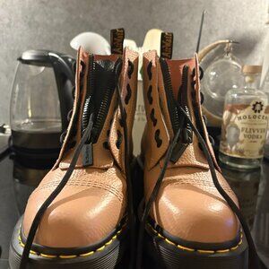 Pink women's Dr Marten's boots & Black women's Aldo boots